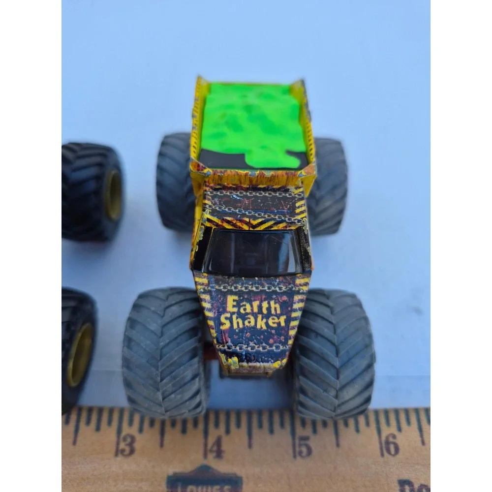 Monster Jam Pirates Curse and Zombie vs Hunter Earth Shaker Die-Cast Truck Lot
